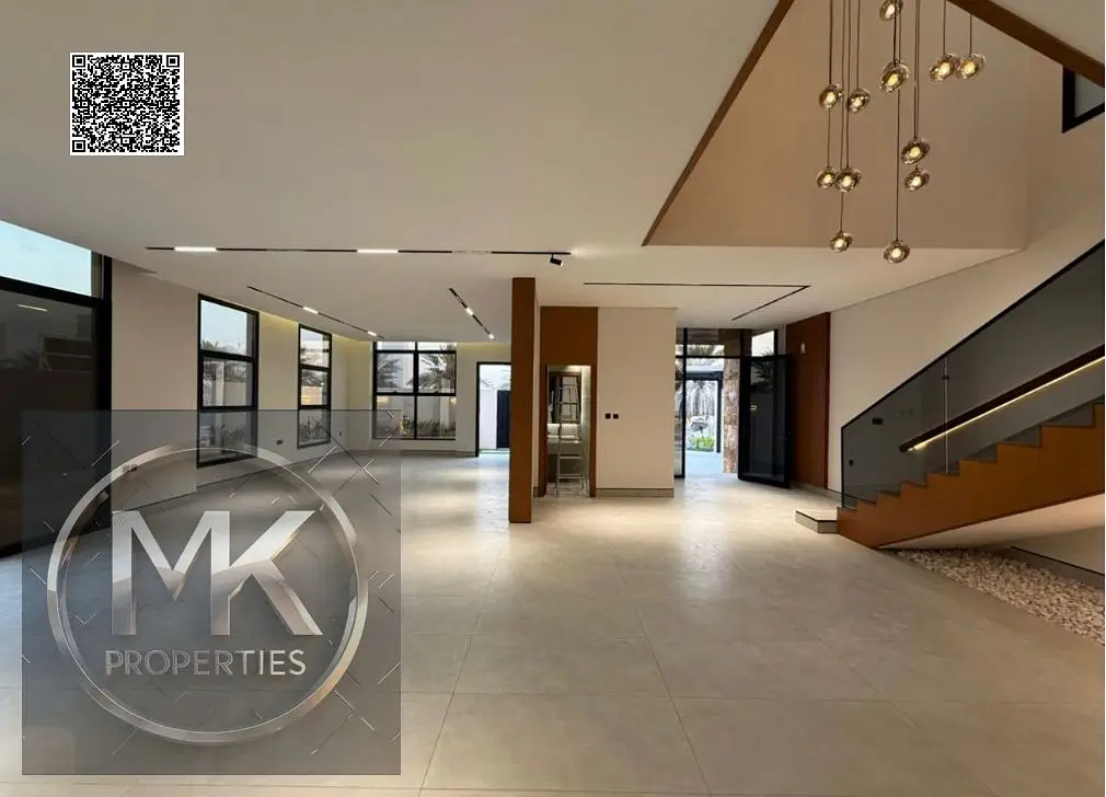 Luxury Villa for Sale in Al Alia – Modern Design & Prime Location Elegant stone façade Modern entrance